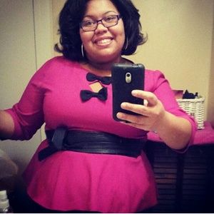 Pink peplum shirt with bows